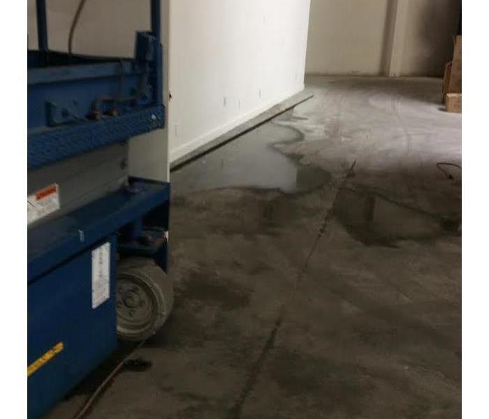 Commercial builing with water damage on the floor